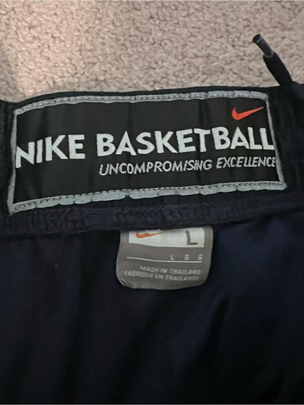Vintage 2000s Nike Men's Dark Navy Athletic Mesh Shorts with White Swoosh